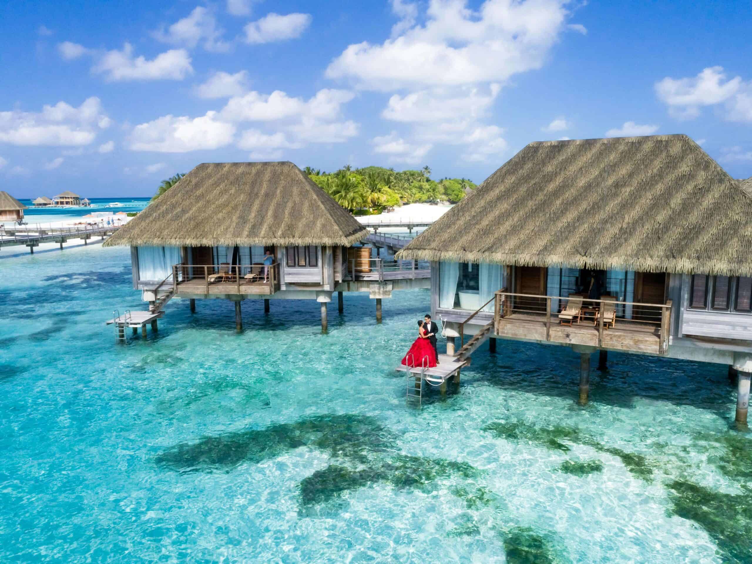 clear sea and beach huts in the maldives