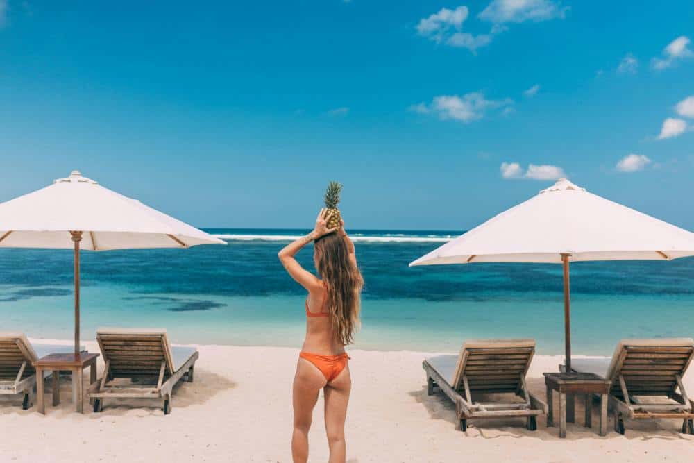A woman in bikini on a beach