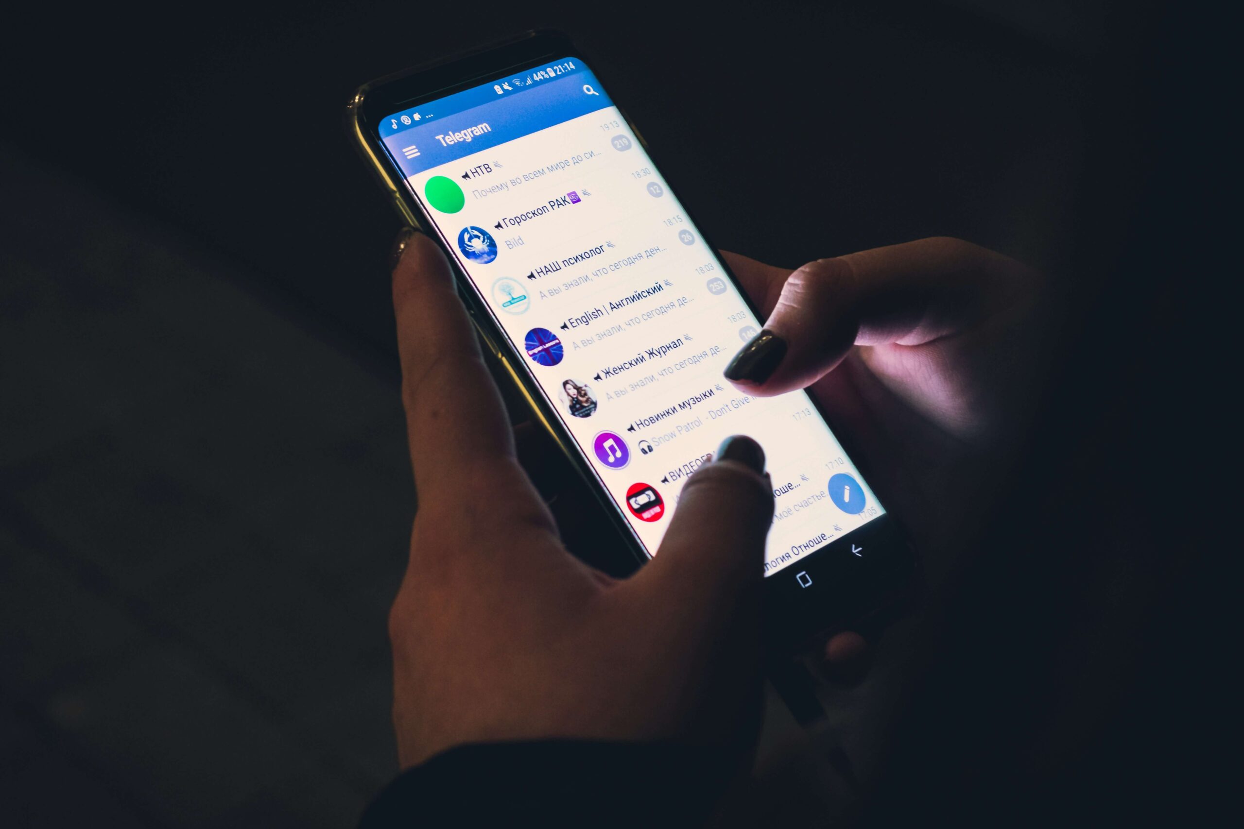 a person using Telegram on their phone