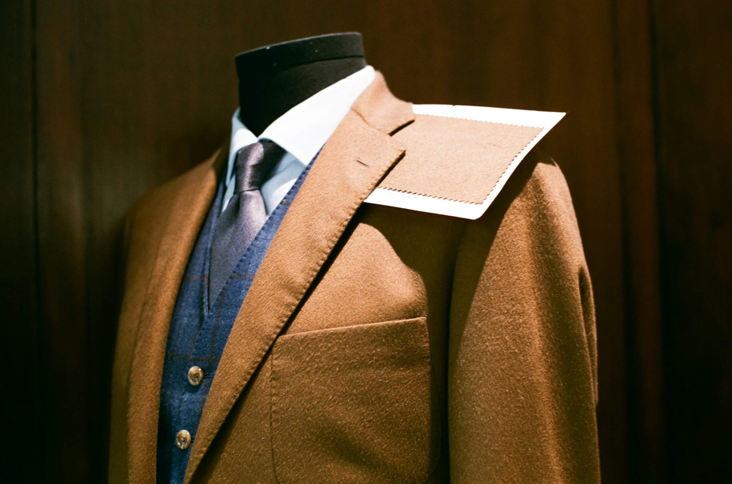 a man's suit on a mannequin
