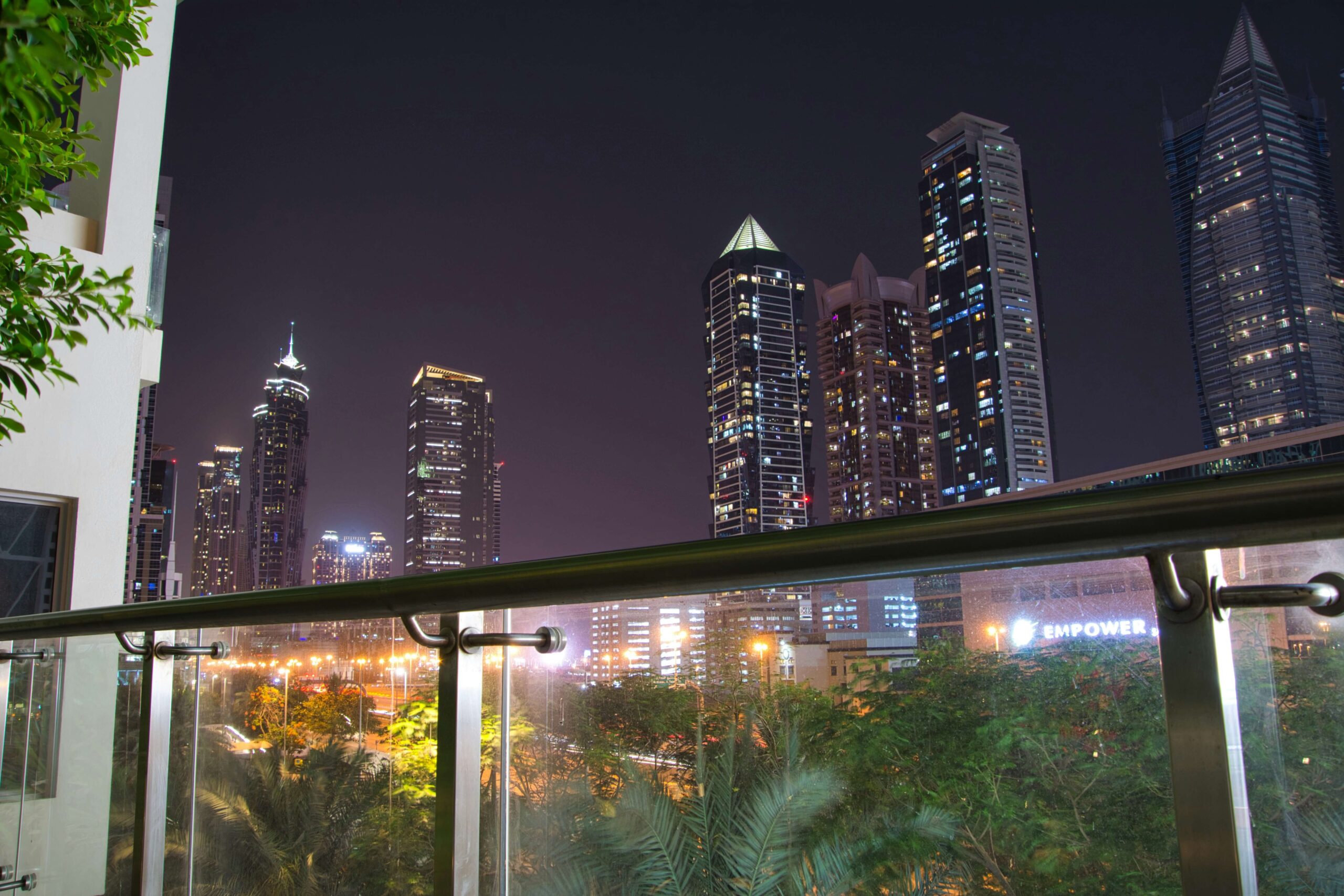 a view of skyscrapers from a rooftop terrace