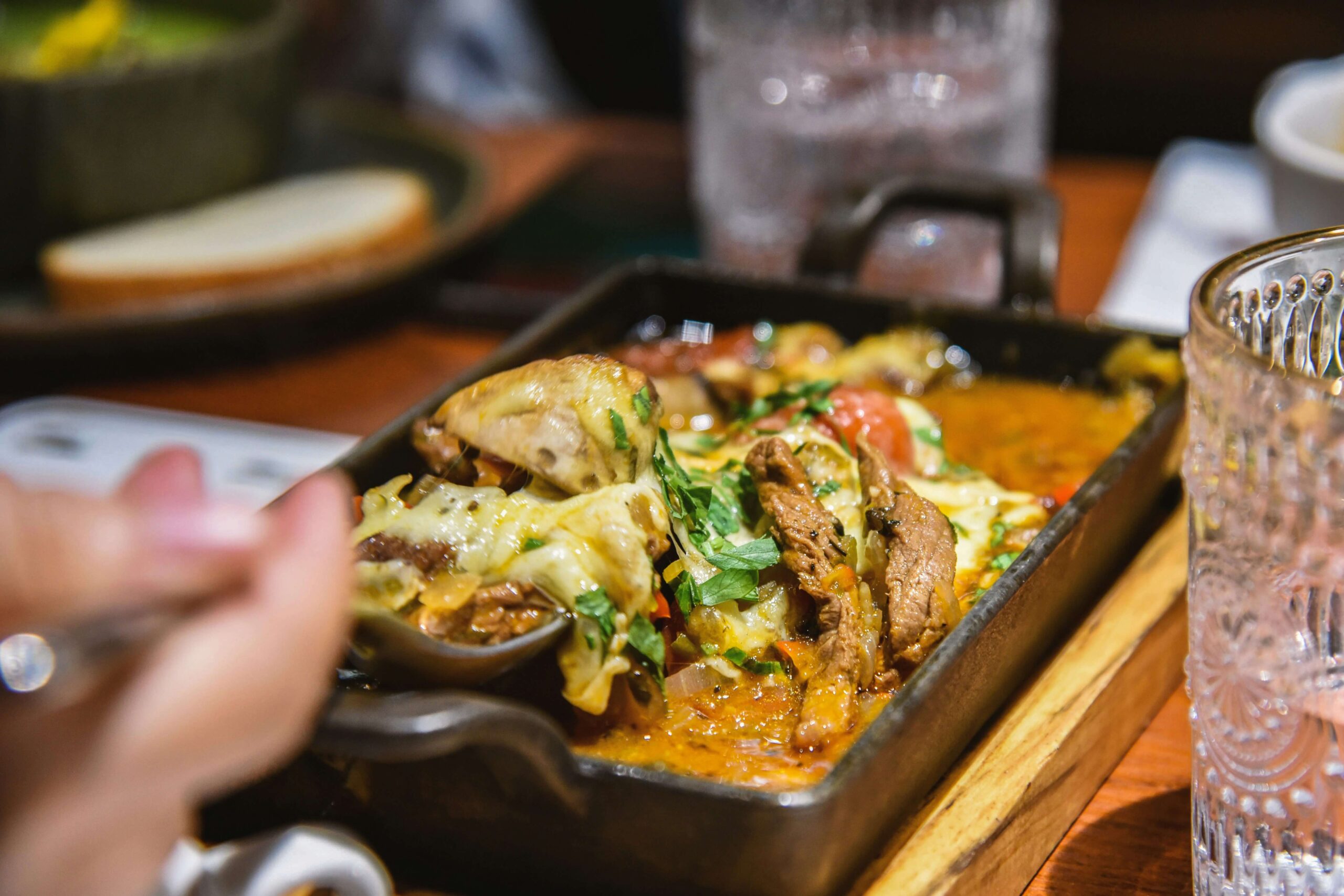 a plate of middle eastern food in a restaurant